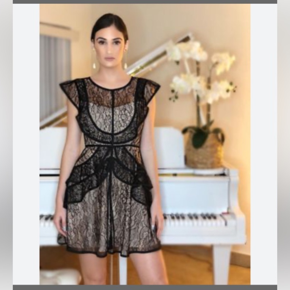 L’ATISTE LACE BLACK DRESS.